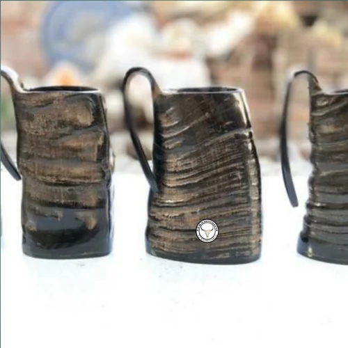 Buffalo drinking Viking horn mug